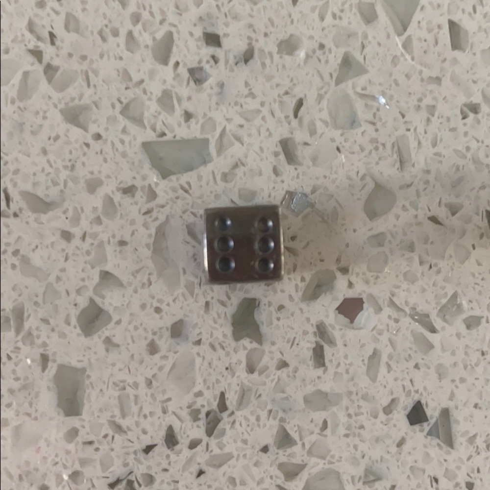 Pandora dice charm needs polished